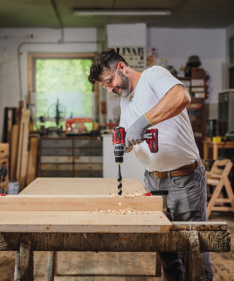 Man drilling in wood