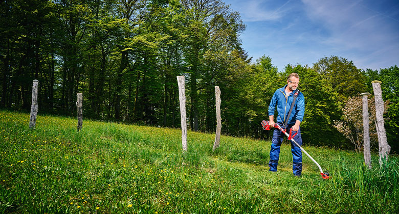 A man using the cordless scythe.