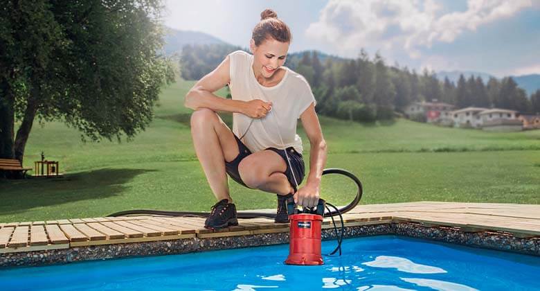 woman using a clear water pump